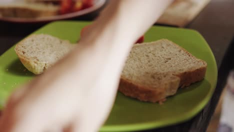 making sandwiches on casual kitchen