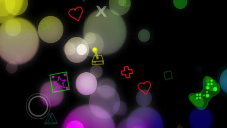animación de puntos coloridos que se mueven e iconos de juegos sobre fondo negro