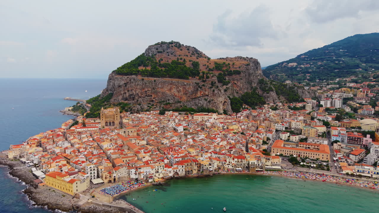 Scenic view of Cefalù coastline in Sicily, Italy, peaceful coastal town
