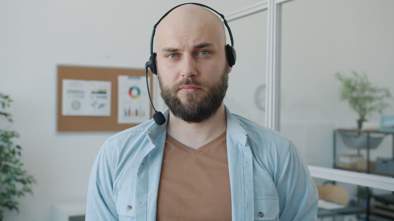 Businessman Wearing Headset in Office