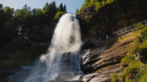 the majestic steinsdalsfossen is a waterfall located 2 kilometers from the town of nurheimsund in th