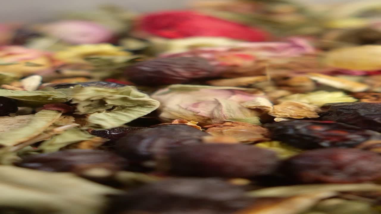 Close-up of a variety of dried fruit and flower tea blend