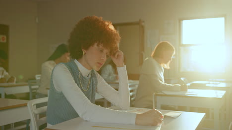 students taking a test in a classroom