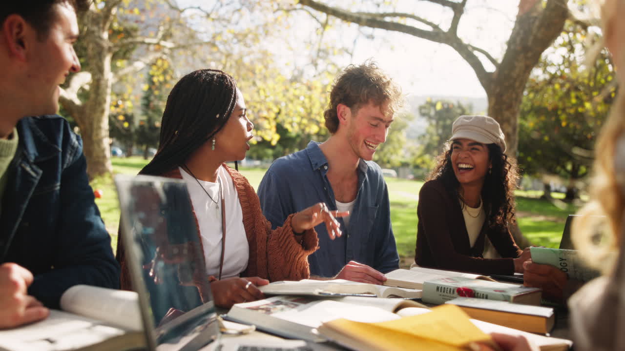 Group of students studying together outdoors