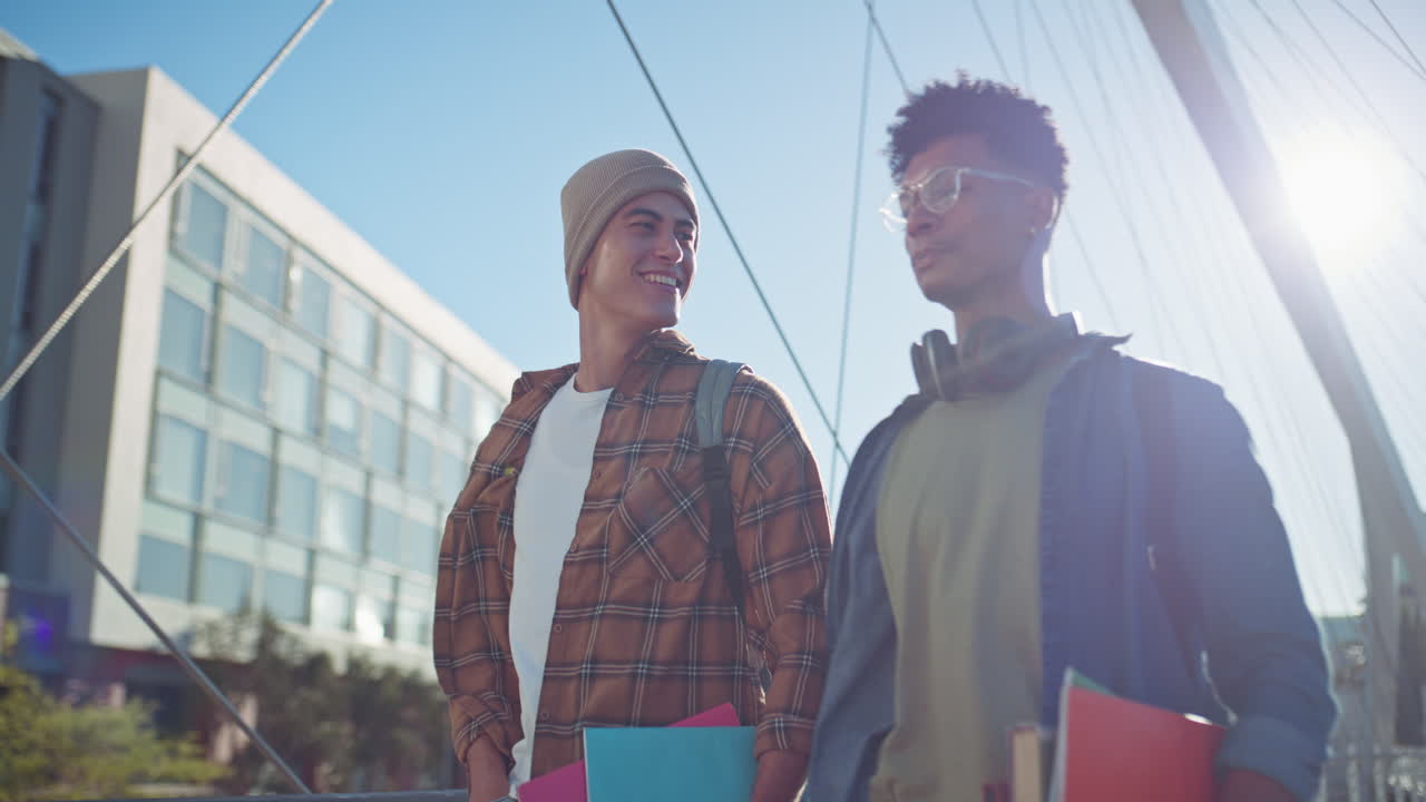 Students walking on campus bridge