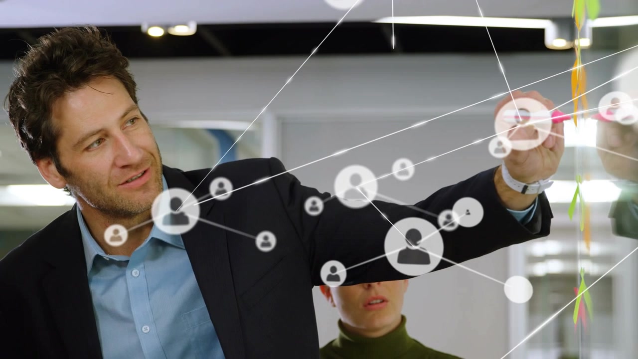 Animation of network of connections over caucasian businesspeople in office