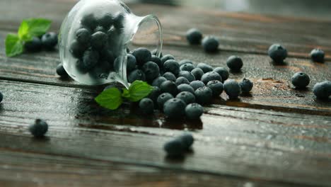 Blueberry-scattering-from-glass-jug