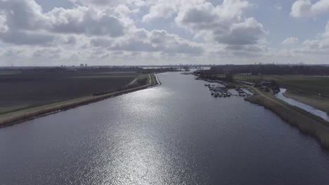 drone shot of small river harbor in nature