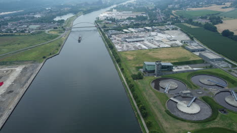 canal, industrial area, and water treatment plant aerial view