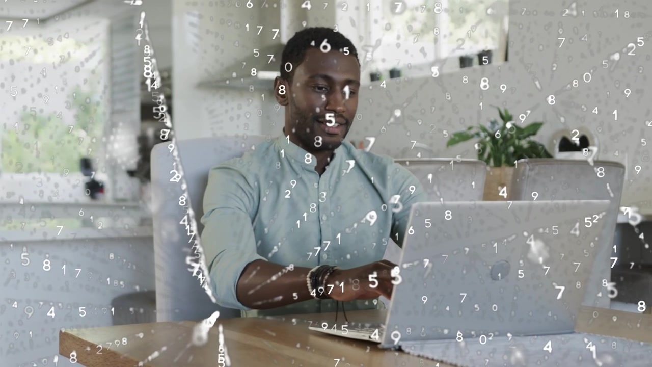 Man typing laptop analyzing finance data, starting numeric overlays, partner approaching with mug