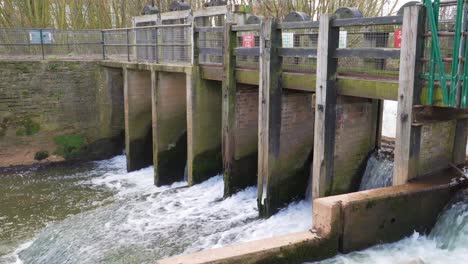 4k water damm, structure of damm, gates for water flow in the river tone taunton somerset