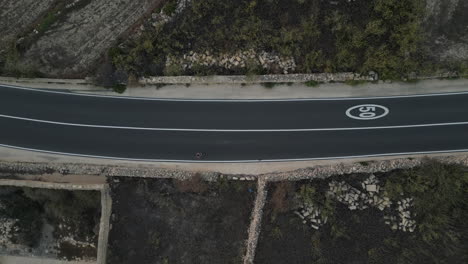 Aerial-Top-down-View-Of-A-Man-Running,-jogging-man