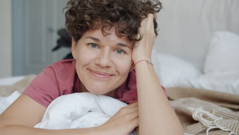 woman relaxing in bed
