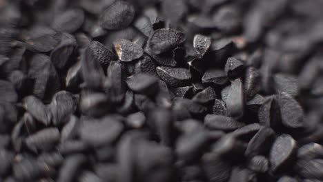 Activated-Charcoal-macro-moving-shallow-focal-field-isolated