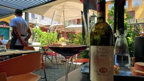 people enjoying wine at an outdoor cafe