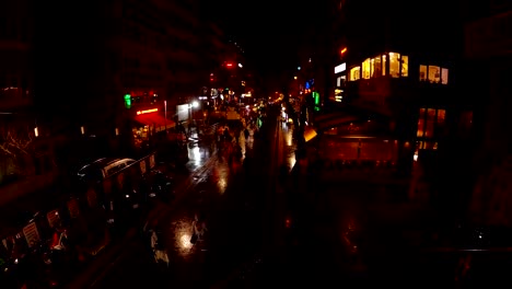 night street with great number of multicoloured lights and passersby marketplace ankara