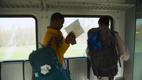 friends walking in the train