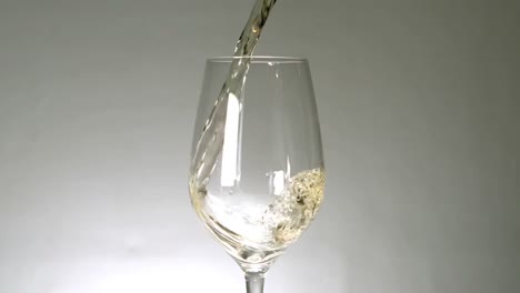 White-wine-pouring-into-wine-glass