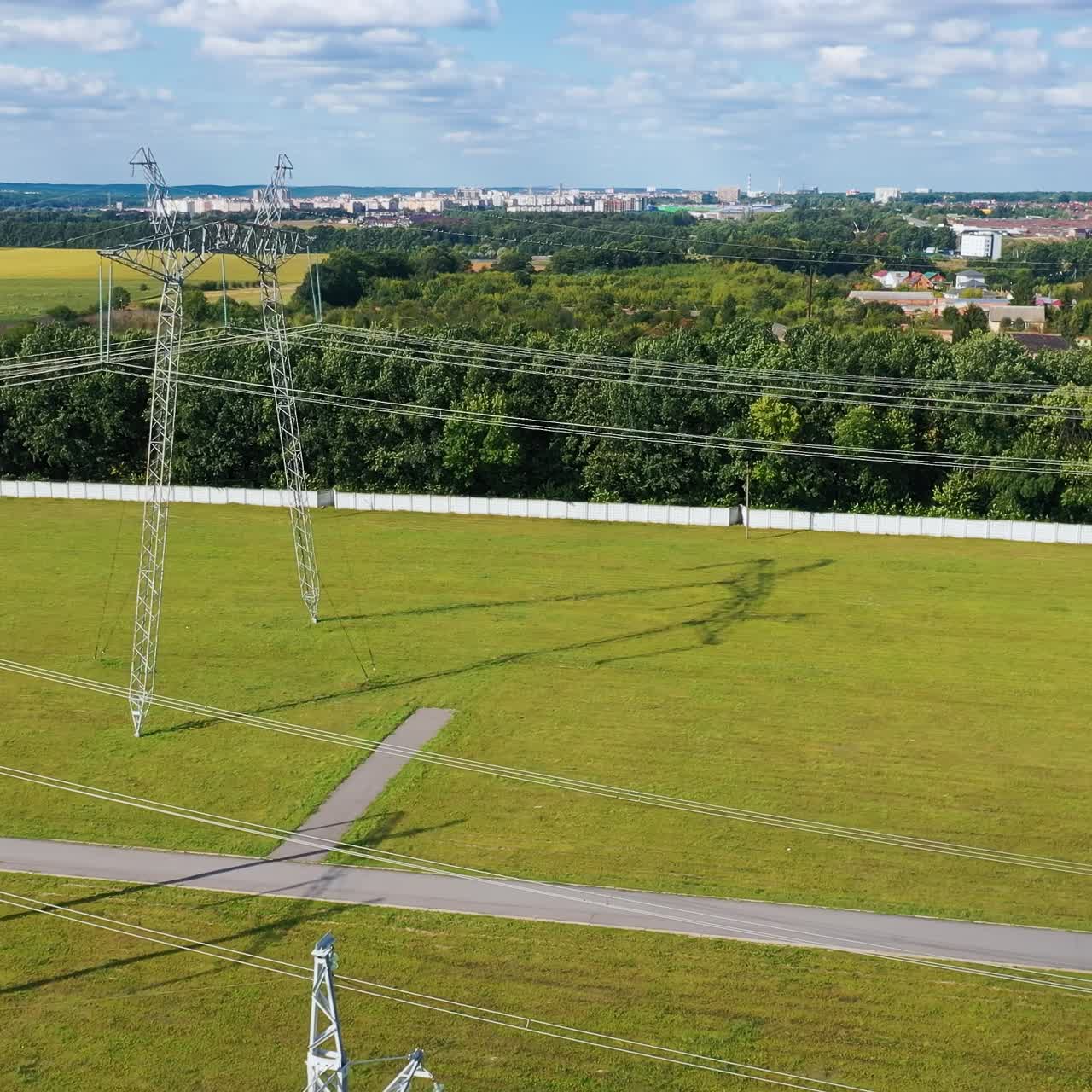 High voltage construction lines aerial view. Big electric distribution industry