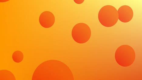 Orange-spheres-floating-against-yellow-background