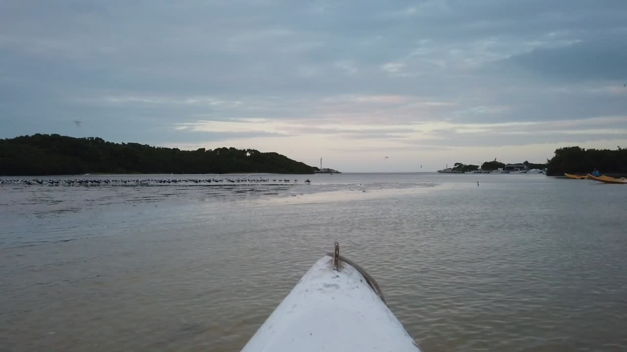 Slow motion clip of kayak in lagoon in Mexico