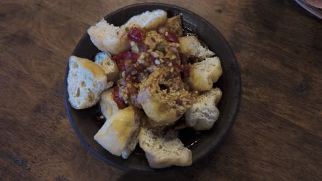 tahu gejrot, an indonesian fried tofu in sweet spicy sauce from cirebon, a port city in west java, indonesia