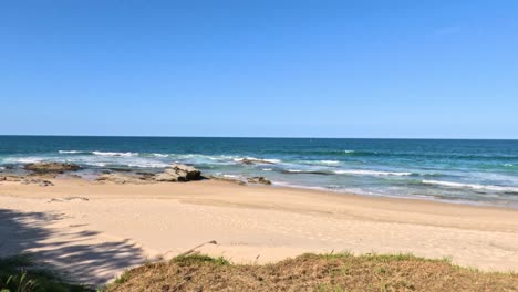 a serene beach with safety signs