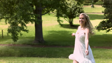 blonde woman dancing in slow motion