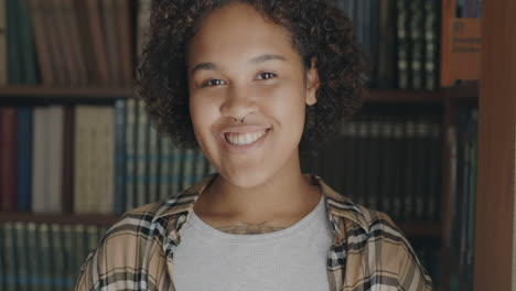 smiling woman in a library