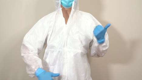 doctor-with-ppe-suit-moving-and-dancing-with-his-hands