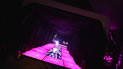 night club empty dance floor pink purple lights private event party