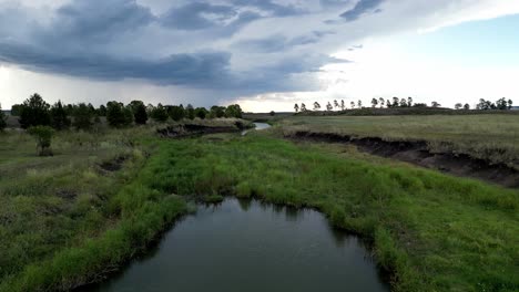 green and grassy calm river in clifton suburb of toowoomba australia
