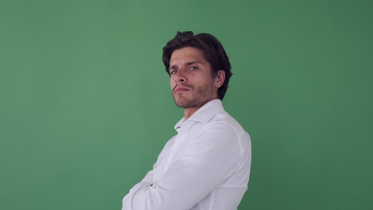 Businessman turning around over green screen
