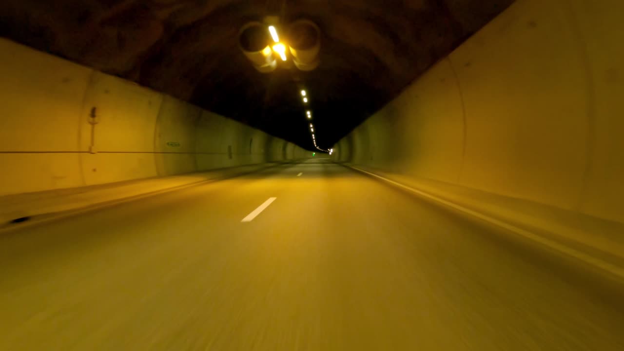 Driving through a Tunnel on a highway. Point of view.