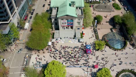 Overhead-view-of-crowd-gathered-at-art-gallery-in-Vancouver