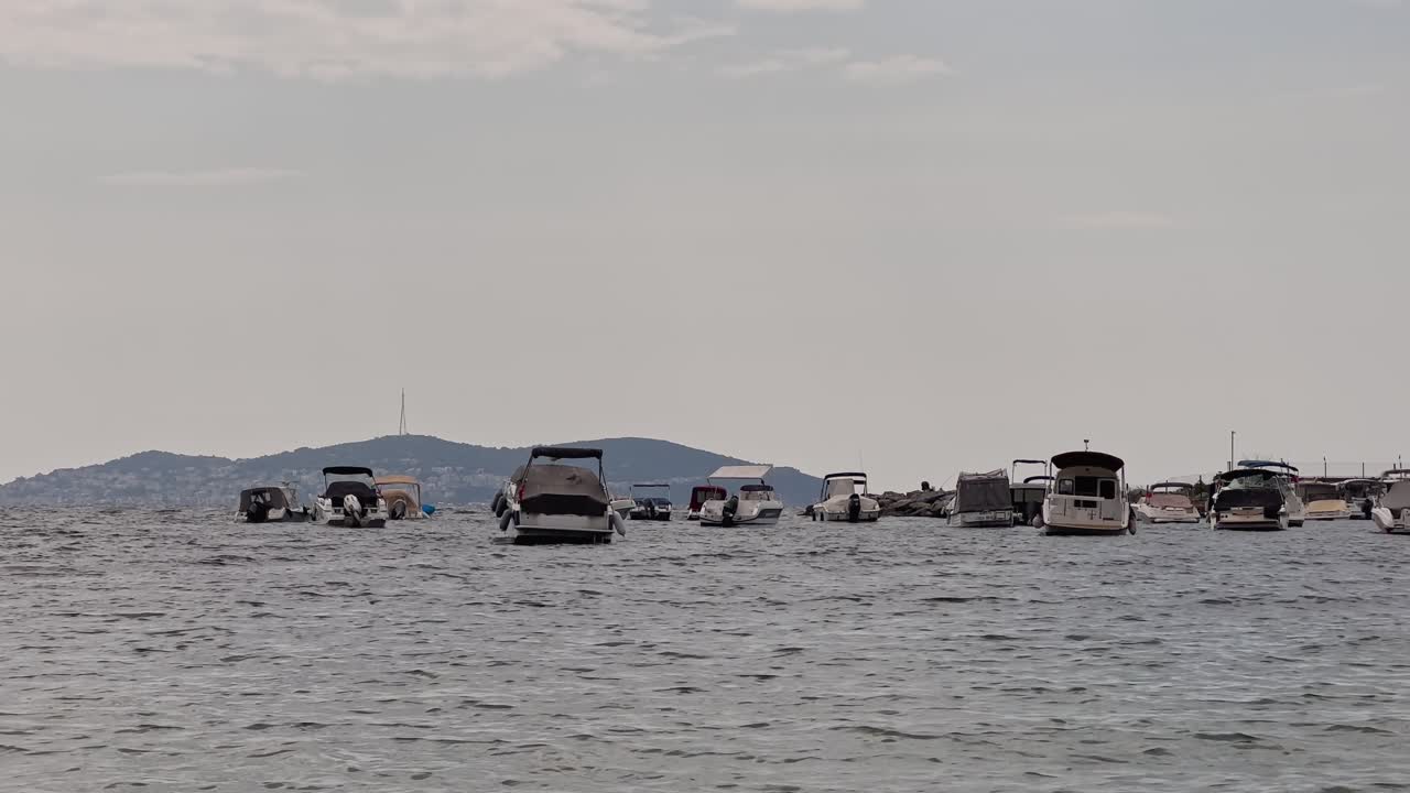 beach, waves in the sea; birds, seagulls flying
