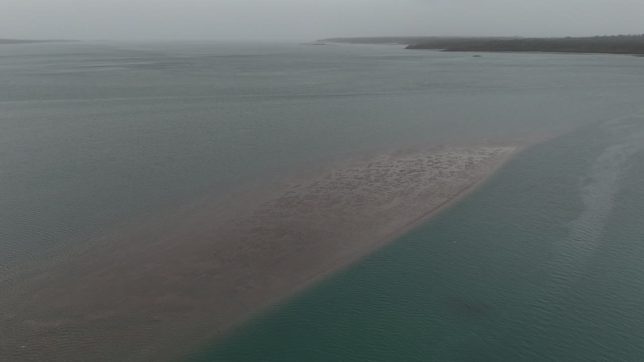 Wide aerial panorama of shallow coastal waters and sandy formations in the Bijagos Islands archipelago in Africa
