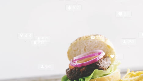 burger with lettuce and onion receiving social media notifications animation