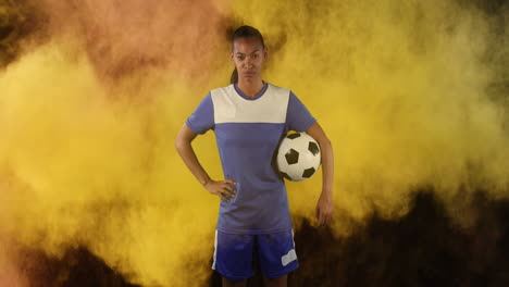 female soccer player against smoke explosion in background