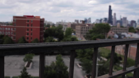 Chicago-Skyline-with-Metal-Railing-in-Foreground