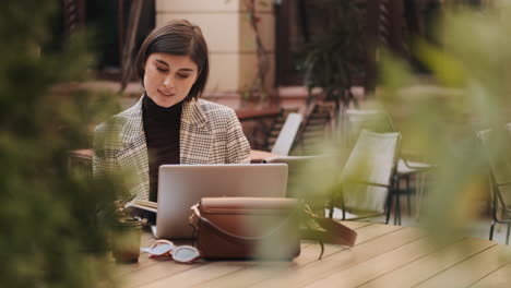 young businesswoman working outdoor.