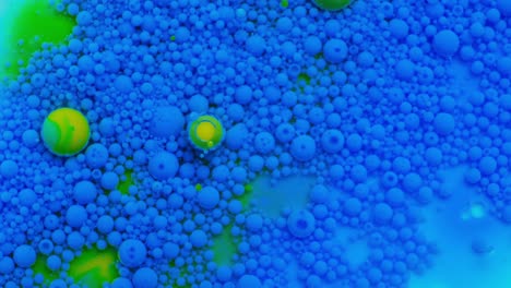 Interaction of liquids of different density. The beauty of physics. Food water-soluble dyes in oil.
