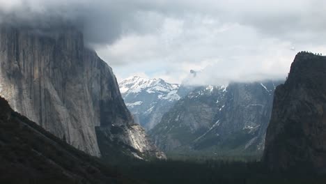 mediumshot yosemite valley cloaked in lowhanging clouds