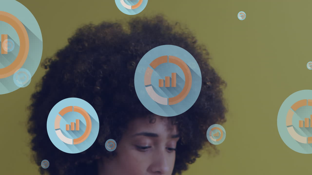 Animation of digital icons against close up of african american woman smiling at office