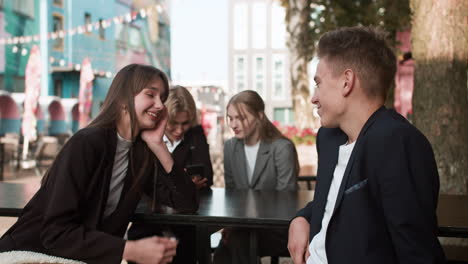 teenagers in love talking outdoors