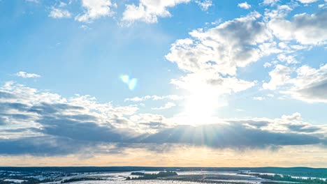 simultaneous movement of clouds of different levels, time intervals, beautiful pre-sunset landscape loop video