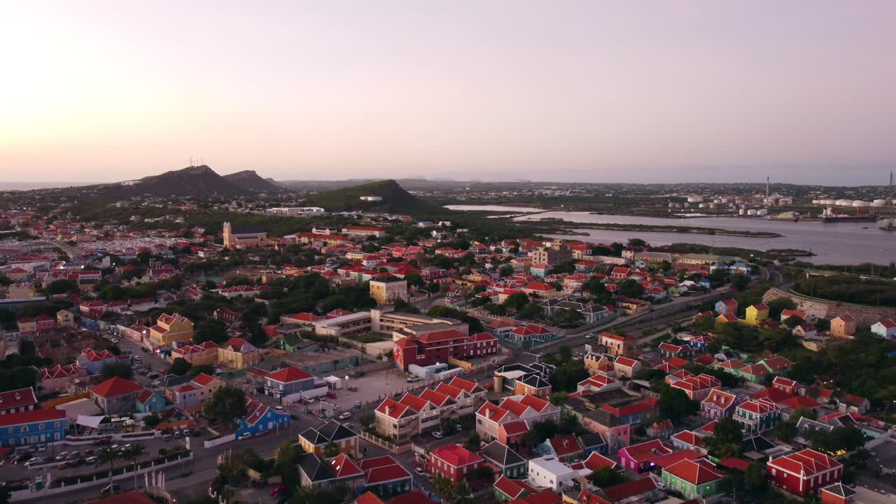 4K Aerial Tilt Over Otrabanda Neighborhood in Willemstad, Curaçao with a view on Seru di Domi summit
