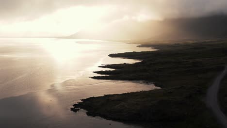 stokksnes coastal bay with super bright sunlight, heavenly concept, aerial