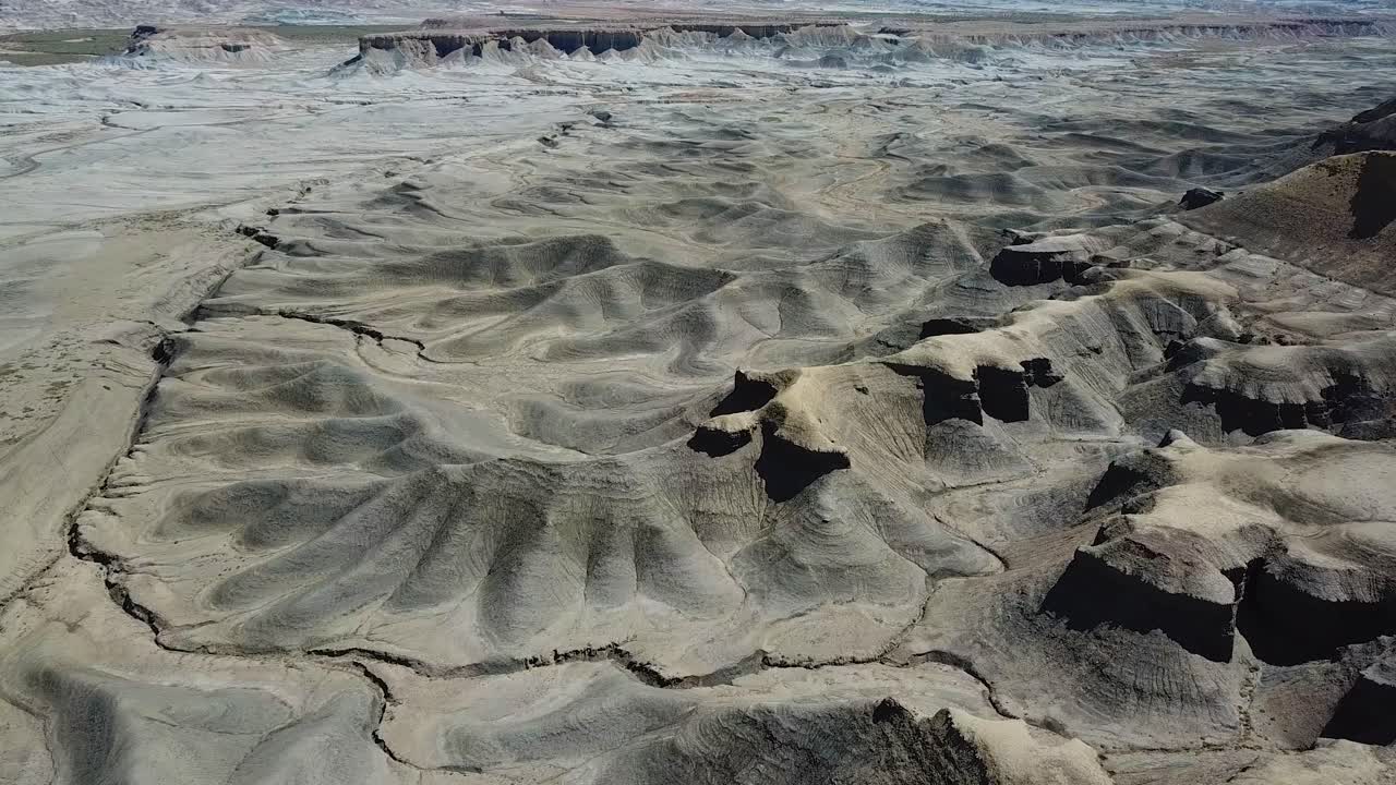 Sandstone Hills in Utah Desert USA. Aerial View of Valley Under Factory Butte Mountain