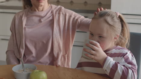 mother and daughter enjoying breakfast